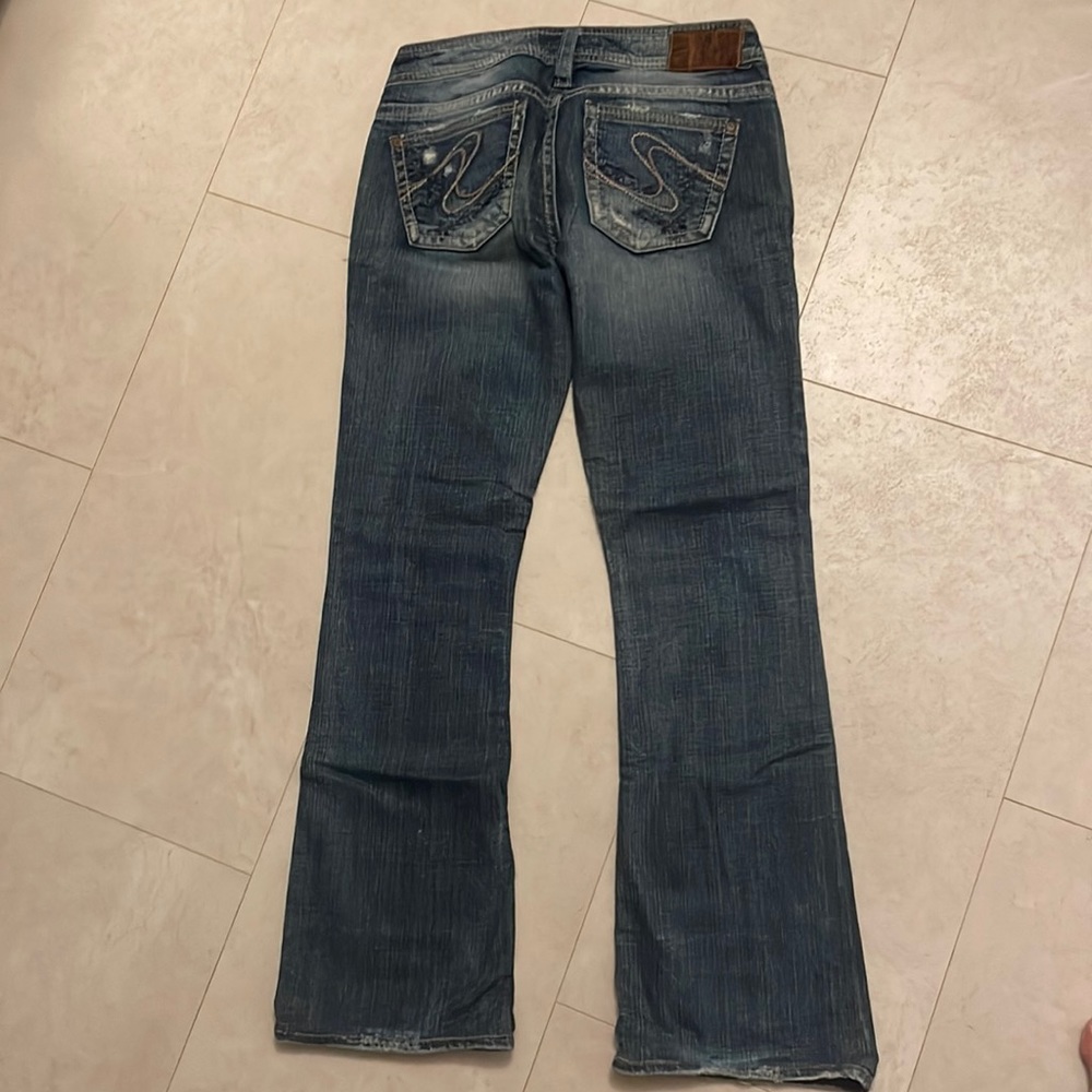 Women’s silver jeans, size 28, low rise boot cut
